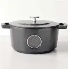  ?? MOMA DESIGN STORE VIA THE ASSOCIATED PRESS ?? Available at the Museum of Modern Art’s store, and made in Holland of recycled iron tracks, the Railway Dutch Oven has a handy thermomete­r built in to help monitor the cooking progress.