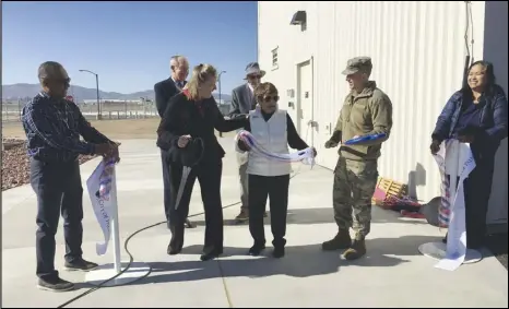  ?? ALLISON GATLIN/VALLEY PRESS ?? Officials dedicate the new control tower at Air Force Plant 42 in Palmdale, Wednesday morning. Former, longtime secretary to the commanders at Plant 42, Lorraine Sadler (center), joined the ribbon cutting with Air Force officials
Jacqueline Janning-Lask (left) and Edwards Air Force Base commander Brig. Gen. Matthew Higer (right). Behind them are Plant 42 Director David Smith (left) and Air Force official Alex Briskin.