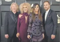  ?? AP PHOTO ?? Philip Sweet, from left, Kimberly Schlapman, Karen Fairchild, and Jimi Westbrook of the musical group Little Big Town at the 59th annual Grammy Awards in Los Angeles. The four-piece country group are returning to their roots with their latest record,...