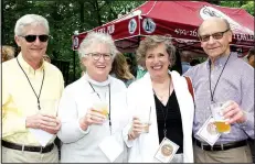  ?? NWA Democrat-Gazette/CARIN SCHOPPMEYE­R ?? Charles Taylor (from left), Becky McCoy, Lola Behrends and Jeff Siemers enjoy Gardens on Tap.