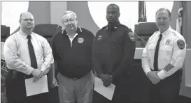  ??  ?? The city of Ringgold welcomed two new officers to its agency with a special swearing-in ceremony on Friday, Sept. 2. From left: officer Christophe­r Faulk, city council member Terry Crawford, officer Brison Strickland, and Police Chief Dan Bilbrey....