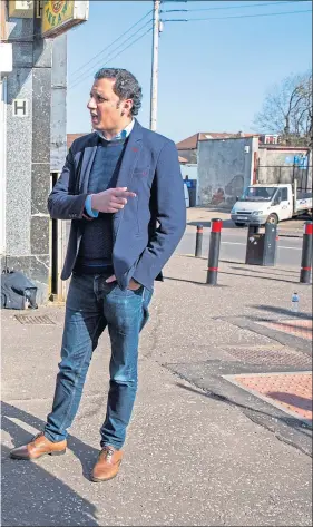  ??  ?? Scottish Labour leader Anas Sarwar chats to Billy Ingram with son Harry in Rutherglen yesterday while
Lib Dem counterpar­t Willie Rennie holds a badger cub at SSPCA rescue centre in Fishcross
Main picture Jamie Williamson