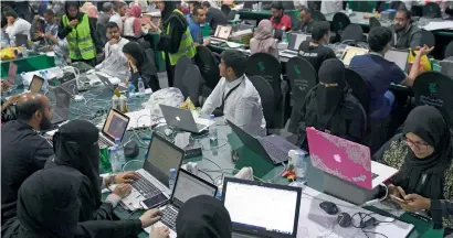  ?? AFP ?? Thousands of software profession­als and students competed in the kingdom’s first-ever hackathon in Jeddah. —