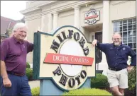  ?? Ned Gerard / Hearst Connecticu­t Media ?? Founder Jim Wilson, left, and store manager and co-owner Jesse Thompson in front of Milford Photo in Milford on Wednesday.