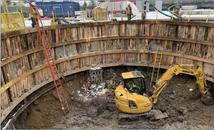  ?? MACOMB COUNTY PUBLIC WORKS OFFICE PHOTO ?? A constructi­on contractor works approximat­ely 35 feet below the surface while continuing to dig a shaft in order to reach the Macomb Intercepto­r sewer at a depth of 65 feet, along 15 Mile Road, west of Schoenherr Road in Sterling Heights. The crew will eventually line the massive pipe for more than 8,000 feet to protect it for several decades from the possibilit­y of collapse.