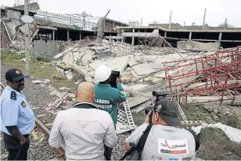  ?? /THULI DLAMINI ?? The Compensati­on Fund is meant, among others, to compensate workers who get injured at work, as in this collapsed constructi­on site in Tongaat, KZN.