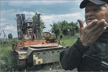  ?? Photograph­s by Marcus Yam Los Angeles Times ?? THE CITY OF LYSYCHANSK in Ukraine’s Luhansk province is littered with the remains of armored vehicles and antitank guns taken out by Russian artillery fire. Most casualties are the result of such barrages.