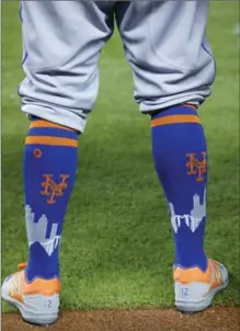  ?? ASSOCIATED PRESS FILE PHOTO ?? New York Mets centre-fielder Juan Lagares’s socks are on full display.