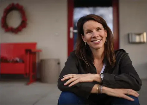  ?? Hyoung Chang / The Denver Post ?? Sara Sutton, CEO and founder of Flexjobs, poses for a portrait at her home in Boulder on Dec. 22, 2020. Flexjobs has helped several large companies go remote.