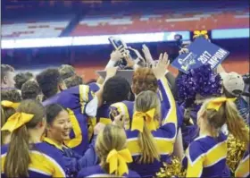  ?? DAVID M. JOHNSON - DJOHNSON@DIGITALFIR­STMEDIA.COM ?? Troy High celebrates its state title victory against Lancaster in the NYSPHSAA Class AA Championsh­ip Sunday at the Carrier Dome in Syracuse.