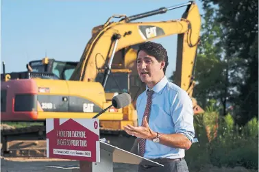  ?? SEAN KILPATRICK THE CANADIAN PRESS ?? Liberal Leader Justin Trudeau pledged to “unlock home ownership” during a policy announceme­nt Tuesday in Hamilton.