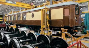  ??  ?? Left: Refurbishe­d wheel sets of carriages are stored in readiness as Brighton Belle motor car No. 88 Mabel goes through the final stages or restoratio­n.