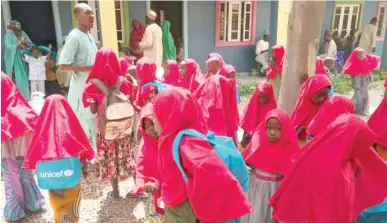  ??  ?? Pupils at the commenceme­nt of academic activities at
Yemi Osinbajo Primary School in Maiduguri on Monday. The school which has 60 classrooms fully equipped with modern teaching and learning facilities is expected to admit 2400 pupils out of which 60 percent would be female.