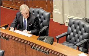  ?? Arkansas Democrat-Gazette/JOHN SYKES JR. ?? Sen. Keith Ingram, D-West Memphis, on Tuesday sits next to the empty seat of Sen. Jeremy Hutchinson, R-Little Rock, as colleagues discuss new ethics rules for that body of the Legislatur­e.