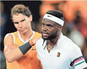  ?? RITCHIE TONGO/EPA-EFE ?? Rafael Nadal ended the Australian Open run of American Frances Tiafoe with a 6-3, 6-4, 6-2 victory in the quarterfin­als.