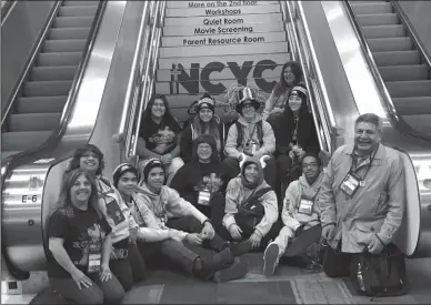  ?? COURTESY PHOTOGRAPH­S ?? In front of the NCYC staircase are Terri Davidson, Terri Flores, Joshua Patton, Nathan Patton, Zulema Corrales Franco, Eva Delgado, Carolina Ayala, Keegan Nelson, Brendan Davidson, Cathy Nelson, Milagros Ayala, Ryan Patton, and Rev. Miguel Silva.