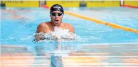  ?? SKIPPY LUMAWAG/SDD-CMO ?? RACE FOR GOLD. Davao City’s Fritz Jun Rodriguez races to clinch the men’s 50-meter breastroke gold medal for Mindanao-Philippine­s in the 10th BIMPNT-Eaga Friendship Games 2018 at the Hassanal Bolkiah National Sports Complex in Bandar Seri Begawan, Brunei yesterday morning.