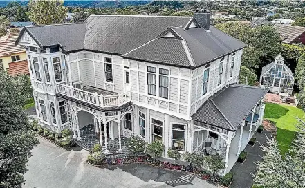  ??  ?? Anson House, an original bay villa built in 1899, features native timber panelling and a stained glass skylight.