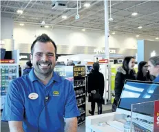  ?? ALLAN BENNER/STANDARD STAFF ?? Jason Rossi, general manager at Best Buy's St. Catharines store, says people were lining up in the wee-hours of the morning to take advantage of Boxing Day sales.