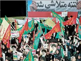  ?? HAMED MALEKPOUR/EPA-EFE ?? Counter-protesters rally Saturday in support of Iran’s supreme leader and government.