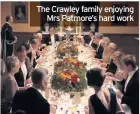  ??  ?? The Crawley family enjoying
Mrs Patmore’s hard work