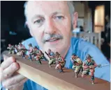  ?? Photo: ANDY JACKSON/ FAIRFAX NZ ?? New Plymouth’s Alistair Mundell is one of dozens of wargamers from around the country painting thousands of figurines of Anzac and Turkish soldiers for Sir Peter Jackson’s Great War Exhibition.