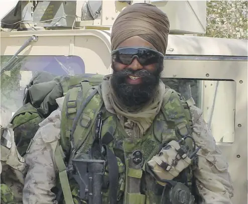  ?? POSTMEDIA NEWS ?? Future Defence Minister Harjit Sajjan during one of his tours in Afghanista­n.