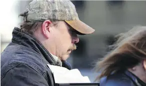  ?? RYAN MCLEOD ?? Duane Lucius, father of murdered Amber Lucius, stands outside the Alberta Court of Queen’s Bench in Calgary Friday. Amber was murdered by her mother, Laura Coward, who is still to be sentenced.