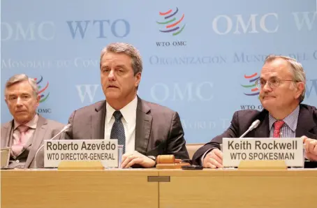  ??  ?? On December 10, 2019, WTO Director General Azevêdo (C) speaks at a press conference after a two-day meeting of the WTO's General Council in Geneva, Switzerlan­d and points out that though the expiry of the WTO Appellate Body, no doubt, impairs the WTO's dispute settlement mechanism, it does not mean the end of the rule-based dispute settlement mechanism.