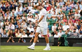  ?? DAVID RAMOS / GETTY IMAGES ?? Bothered by a sore left knee, third-ranked Stan Wawrinka (above) labored through a 6-4, 3-6, 6-4, 6-1 loss to 21-year-old Russian Daniil Medvedev.