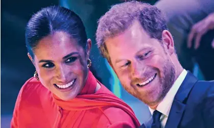 ?? Photograph: Oli Scarff/AFP/Getty Images ?? Meghan, Duchess of Sussex and Prince Harry, Duke of Sussex, attend the annual One Young World Summit in Manchester in September 2022. A spotify executive has labeled the pair ‘fucking grifters’