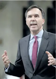  ?? ADRIAN WYLD/THE CANADIAN PRESS ?? Finance Minister Bill Morneau is threatenin­g to take the Conservati­ves to court over an insinuatio­n by Tory finance critic Pierre Poilievre.