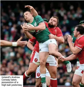  ?? ?? Ireland’s Andrew Conway takes possession of a high ball yesterday