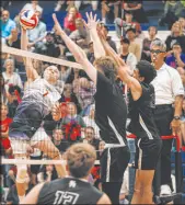  ?? Madeline Carter Las Vegas Review-journal ?? Coronado outside hitter Dane Galvin hits the ball past two Shadow Ridge blockers during a four-set victory over the two-time defending Class 5A state champions.