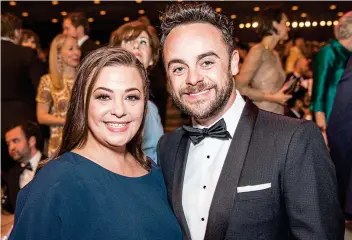  ??  ?? Divorce: Ant McPartlin with his ex Lisa Armstrong at the BAFTA awards in 2017
