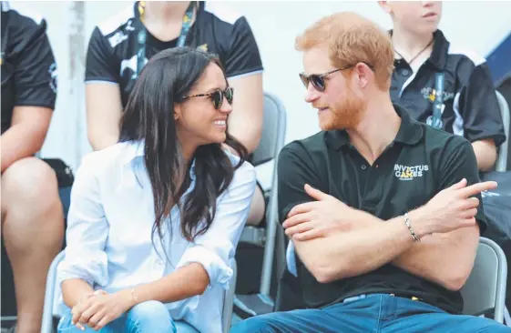  ??  ?? Prince Harry and Meghan Markle at the Invictus Games in Toronto. The couple announced their engagement last night. Pictures: GETTY, AAP