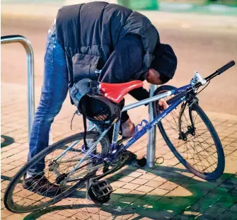  ??  ?? Going nowhere: A Spice addict doubles over near the city’s train station