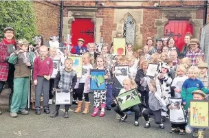  ??  ?? The whole school dressed up on their farming/cow-themed non-uniform fundraisin­g day