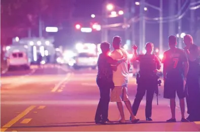  ?? Phelan M. Ebenhack / Associated Press 2016 ?? Polarized views on terrorism: The massacre at the Pulse nightclub in Orlando left 49 people dead.