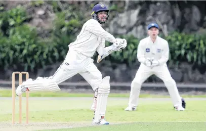  ?? PHOTOS: GETTY IMAGES ?? If it works . . . Otago allrounder Michael Rippon swats a four on his way to a maiden century as Auckland wicketkeep­er Ben Horne looks on during day one of a Plunket Shield match at Eden Park Outer Oval yesterday. Below: Rippon celebrates his century.