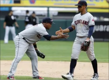  ?? ASSOCIATED PRESS FILE ?? The Indians’ Jose Ramirez, left, and Francisco Lindor celebrate the team’s 5-2 win over the White Sox.