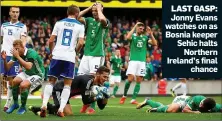  ??  ?? LAST GASP: Jonny Evans watches on as Bosnia keeper Sehic halts Northern Ireland’s final chance