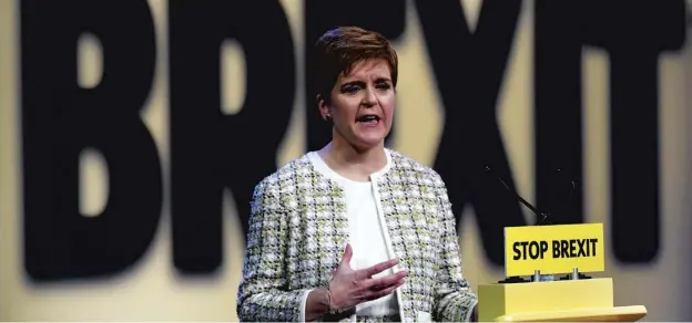  ??  ?? Nicola Sturgeon launches the SNP’S general election manifesto in Glasgow yesterday, warning that a ‘hard’ no-deal Brexit would be disastrous for Scotland