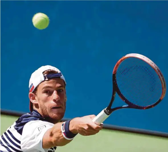  ?? REUTERS PIC ?? Diego Schwartzma­n in action against Marin Cilic during their third round match at US Open on Friday .