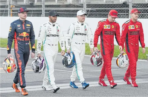  ??  ?? Formula One drivers, from left, Red Bull’s Max Verstappen, Mercedes’ Lewis Hamilton and Valtteri Bottas, and Ferrari’s Charles Leclerc and Sebastian Vettel during a pre-season test in Barcelona in February.