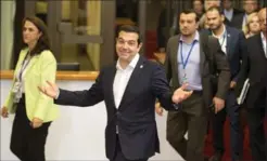  ?? MICHEL EULER, THE ASSOCIATED PRESS ?? Greek Prime Minister Alexis Tsipras leaves after an emergency summit of eurozone heads of state Tuesday promising a written plan on Wednesday.
