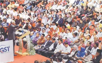  ??  ?? Najib speaks during the briefing session on the GST at Putra World Trade Centre. — Bernama photo