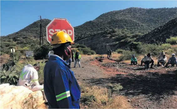  ??  ?? Protesting miners outside the entrance to Lily Mine.