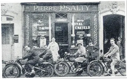  ?? ?? Gwen (centre) outside the shop of Pierre Psalty, the Paris agent for Royal Enfield, during her 1928 trip.