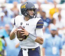  ?? Grant Halverson / Getty Images ?? Cal’s Ross Bowers, who passed for four touchdowns last week, faces a defense that had four intercepti­ons in its first game.